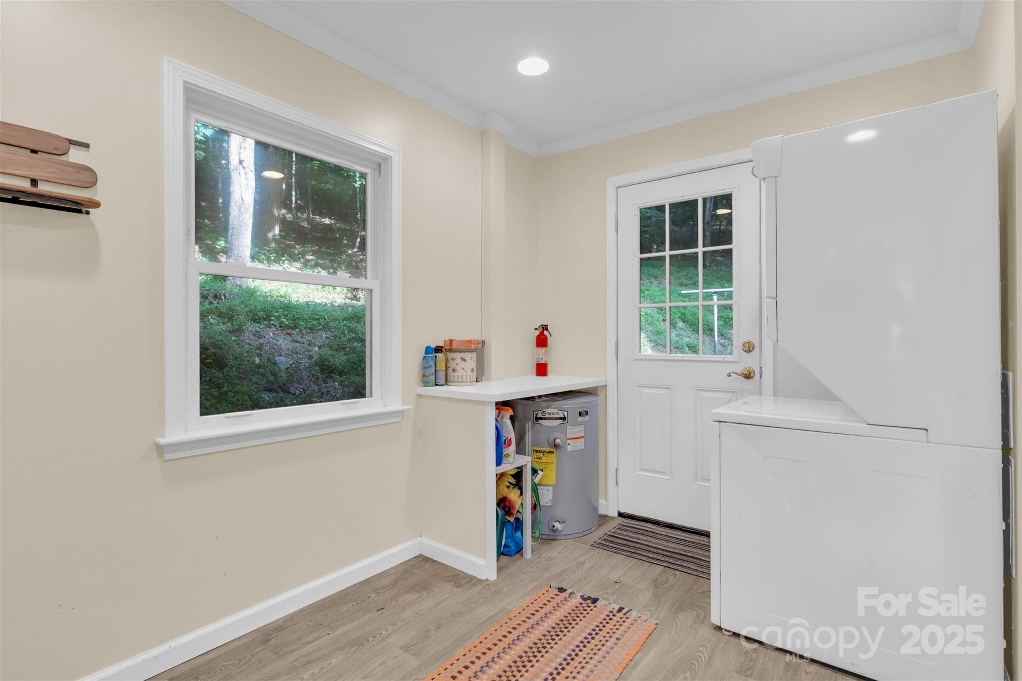 3605 Skyuka Mountain Road Columbus, NC 28722 - Photo 19 of 46 an workspace with wooden floor and a window