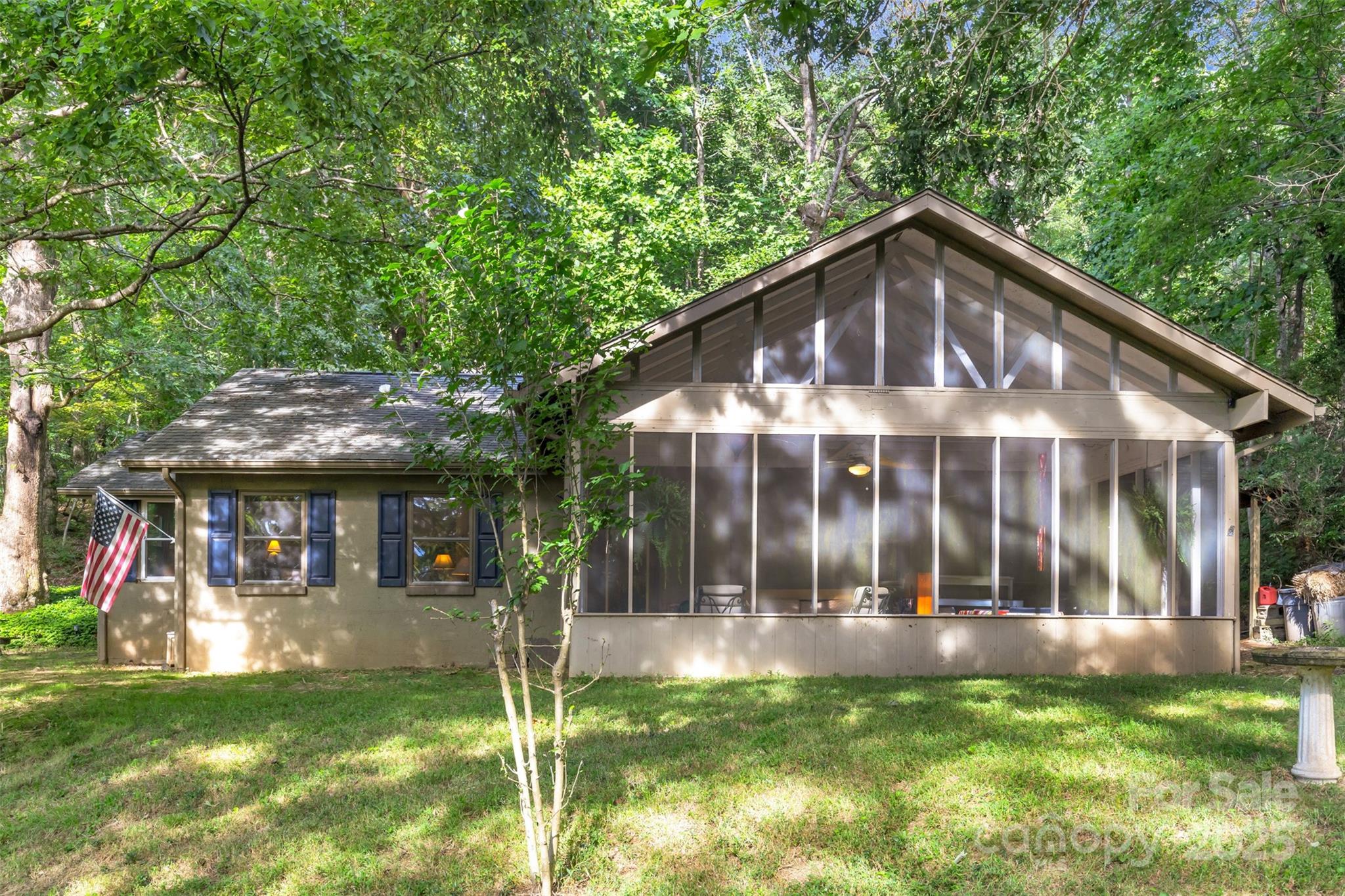3605 Skyuka Mountain Road Columbus, NC 28722 - Photo 2 of 46 a front view of a house with a yard