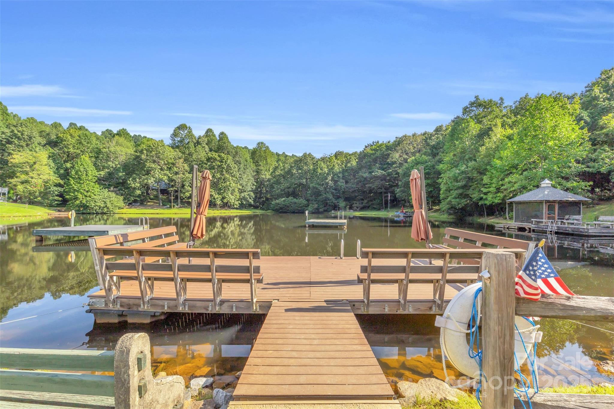 3605 Skyuka Mountain Road Columbus, NC 28722 - Photo 30 of 46 a view of a lake with sitting area