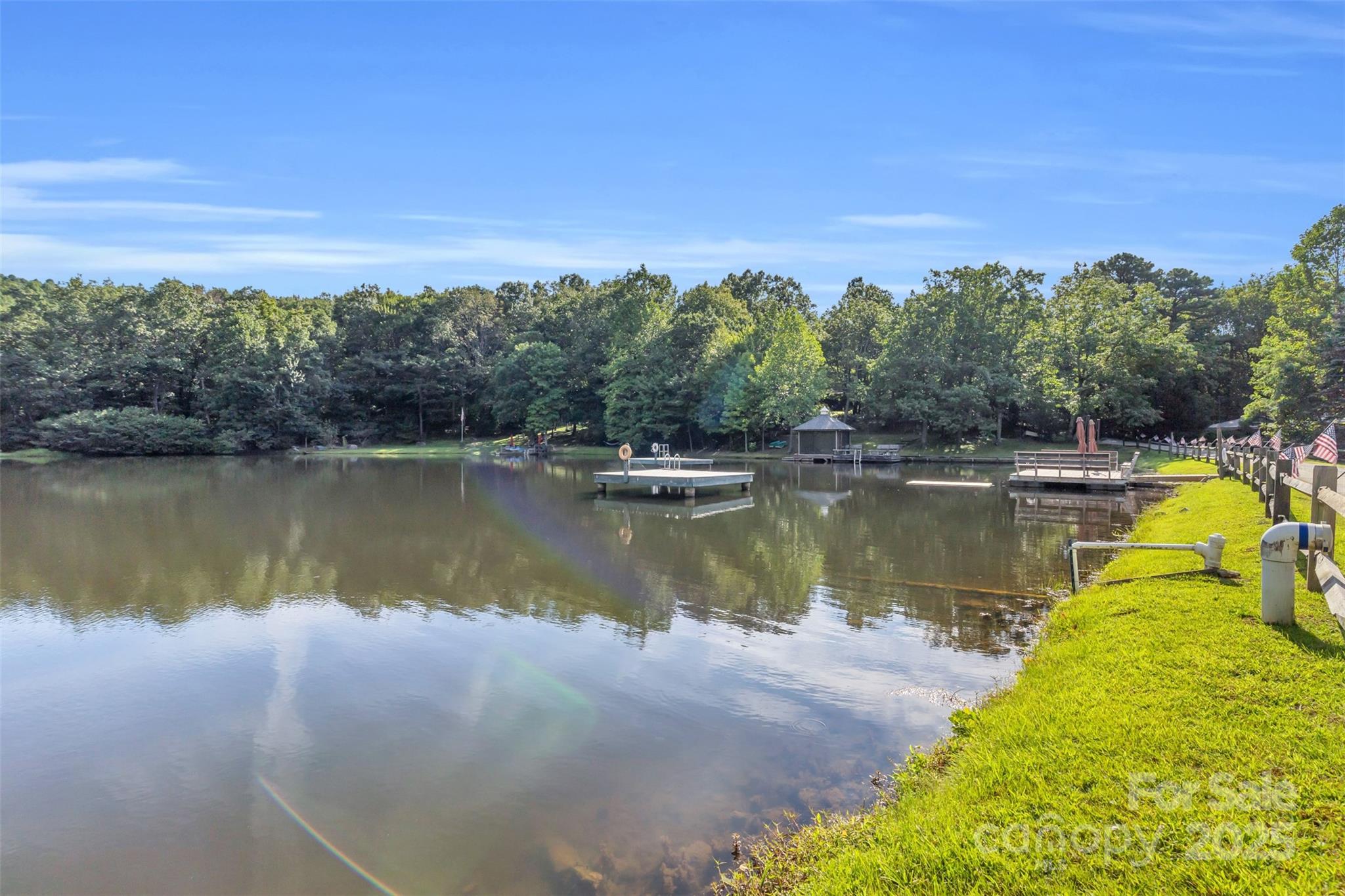3605 Skyuka Mountain Road Columbus, NC 28722 - Photo 33 of 46 a view of a lake with a city