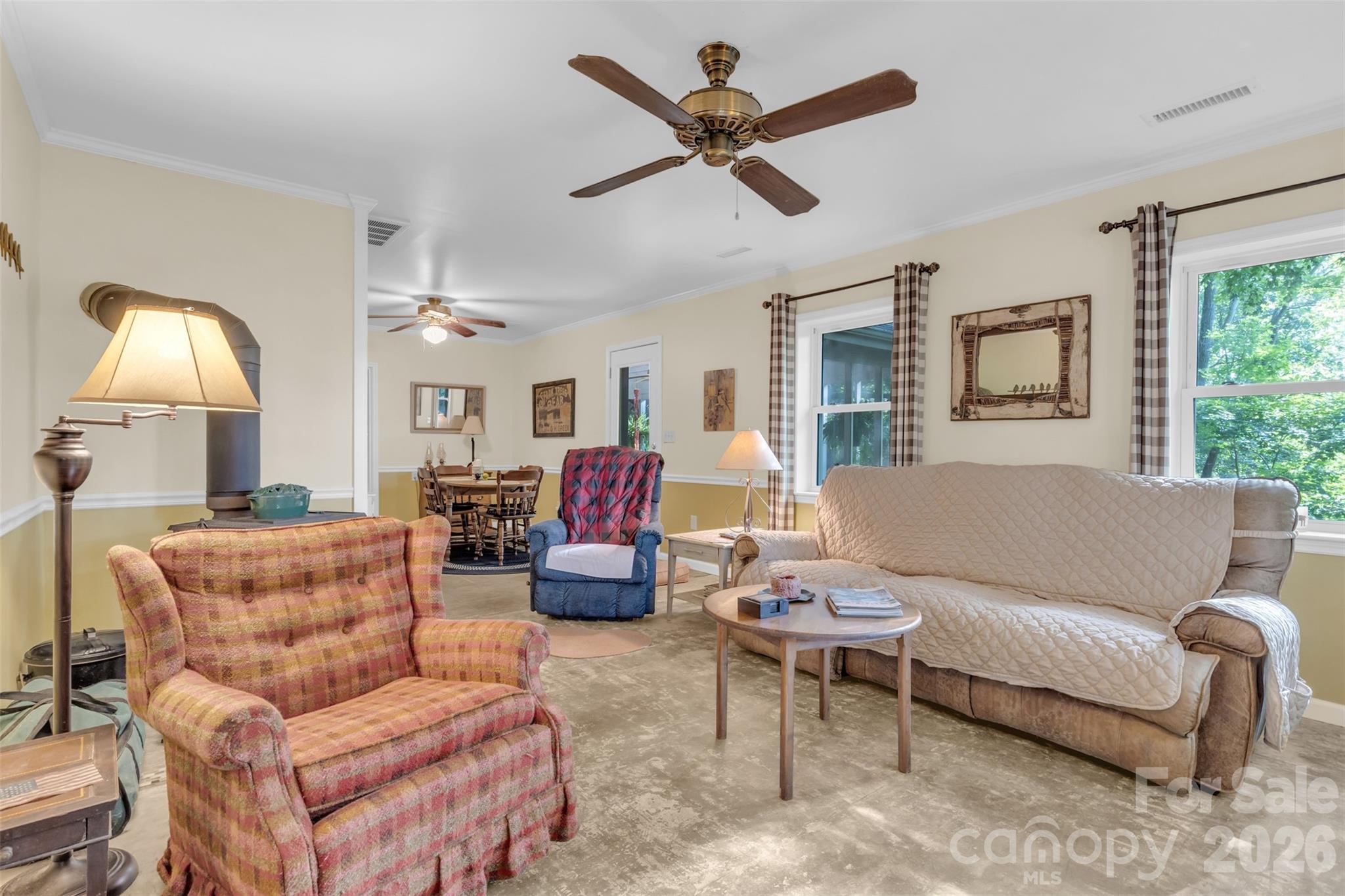 3605 Skyuka Mountain Road Columbus, NC 28722 - Photo 6 of 48 a living room with furniture and a large window