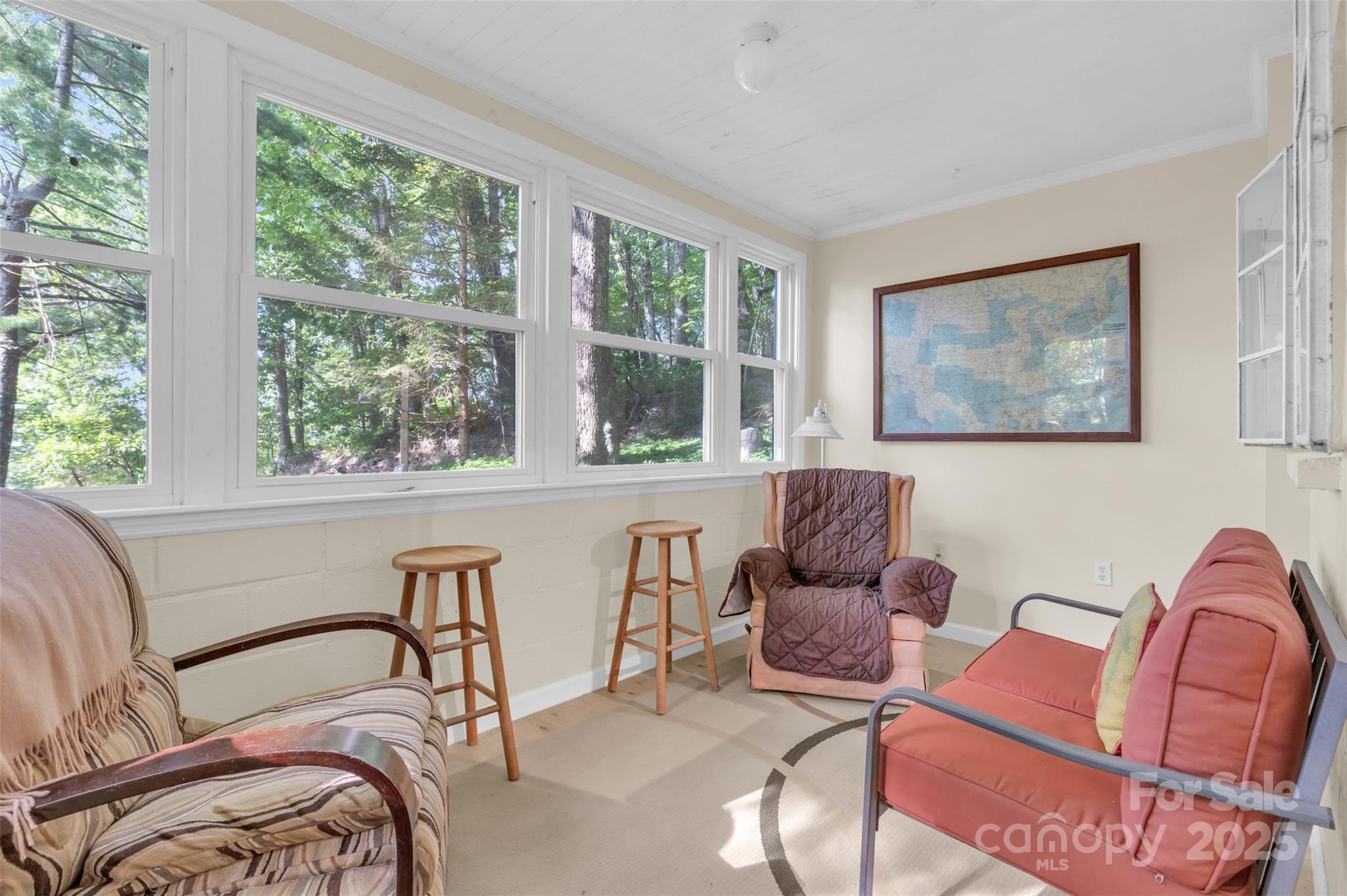 3605 Skyuka Mountain Road Columbus, NC 28722 - Photo 10 of 46 a bedroom with furniture and a large window