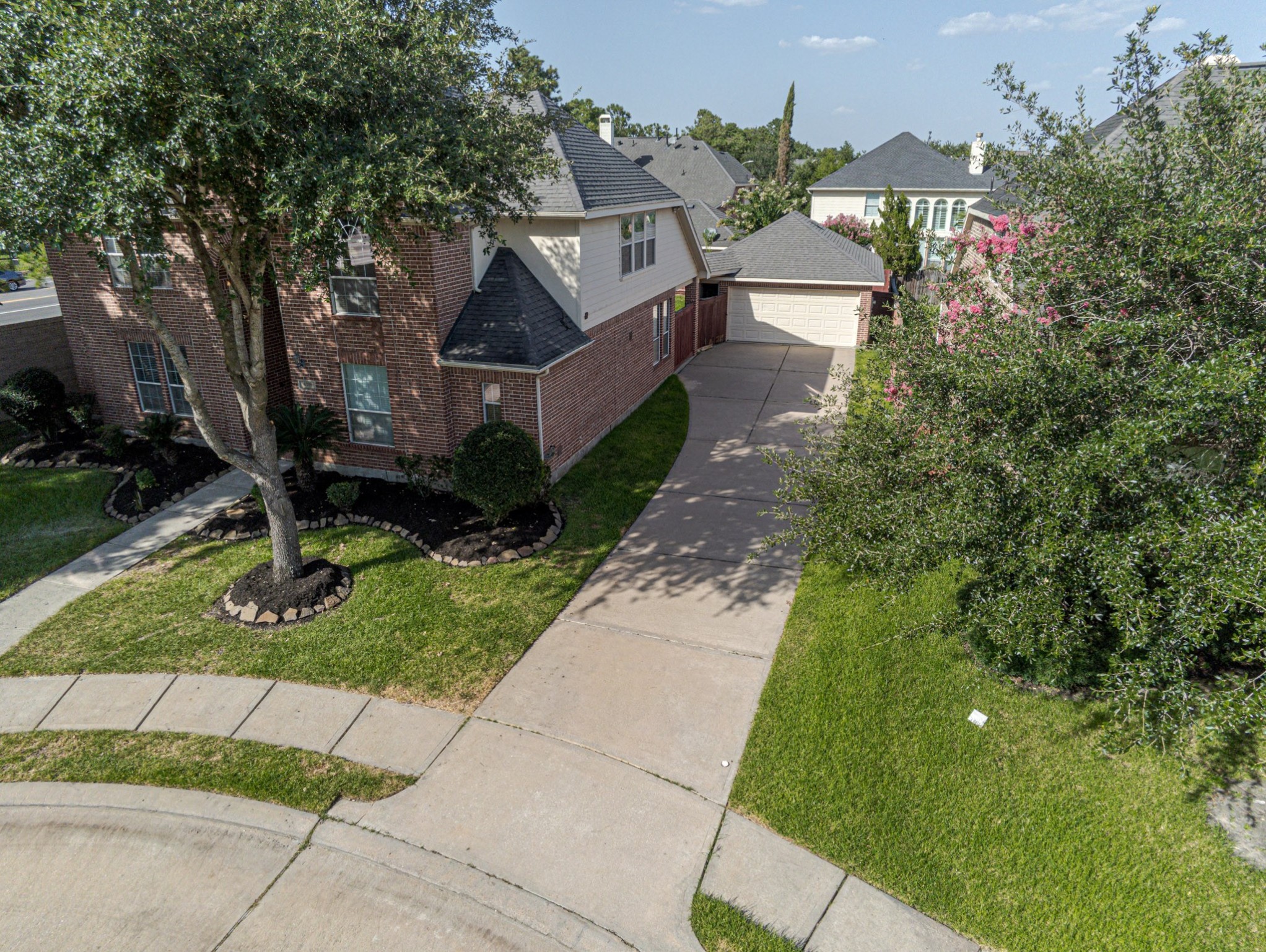6518 Montana Ridge Court Houston, TX 77041 - Photo 22 of 27 a front view of a house with garden