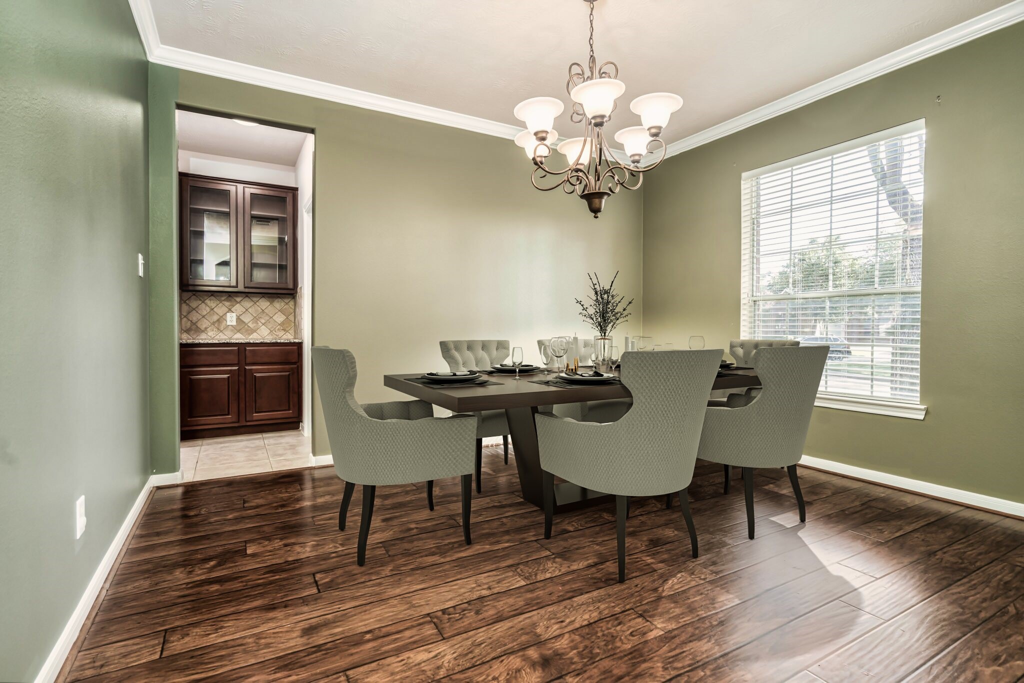 6518 Montana Ridge Court Houston, TX 77041 - Photo 4 of 27 a view of a dining room with furniture wooden floor and chandelier