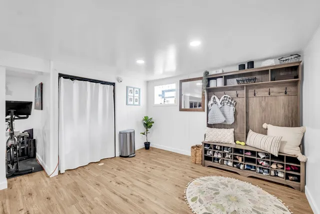 a bedroom with furniture and a bed