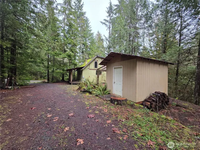 a backyard of a house with lots of green space