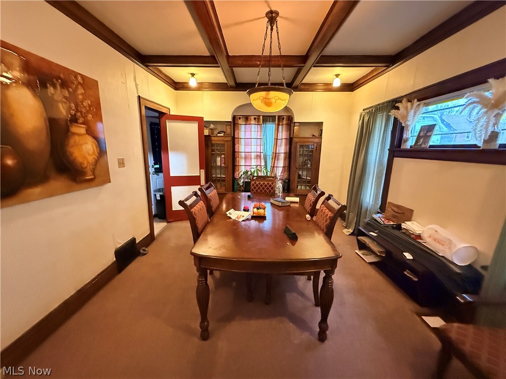 980 Brunswick Road Cleveland Heights, OH 44112 - Photo 6 of 11 Dining room featuring coffered ceiling, carpet floors, and crown molding