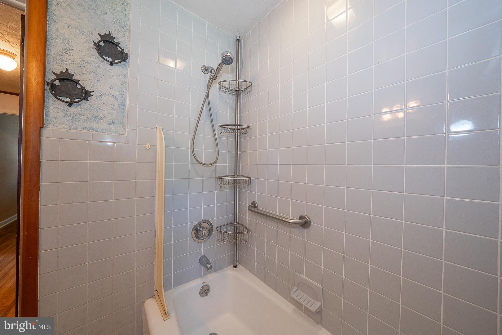 437 Rittenhouse Circle Havertown, PA 19083 - Photo 28 of 55 Modern shower with sleek tile design.