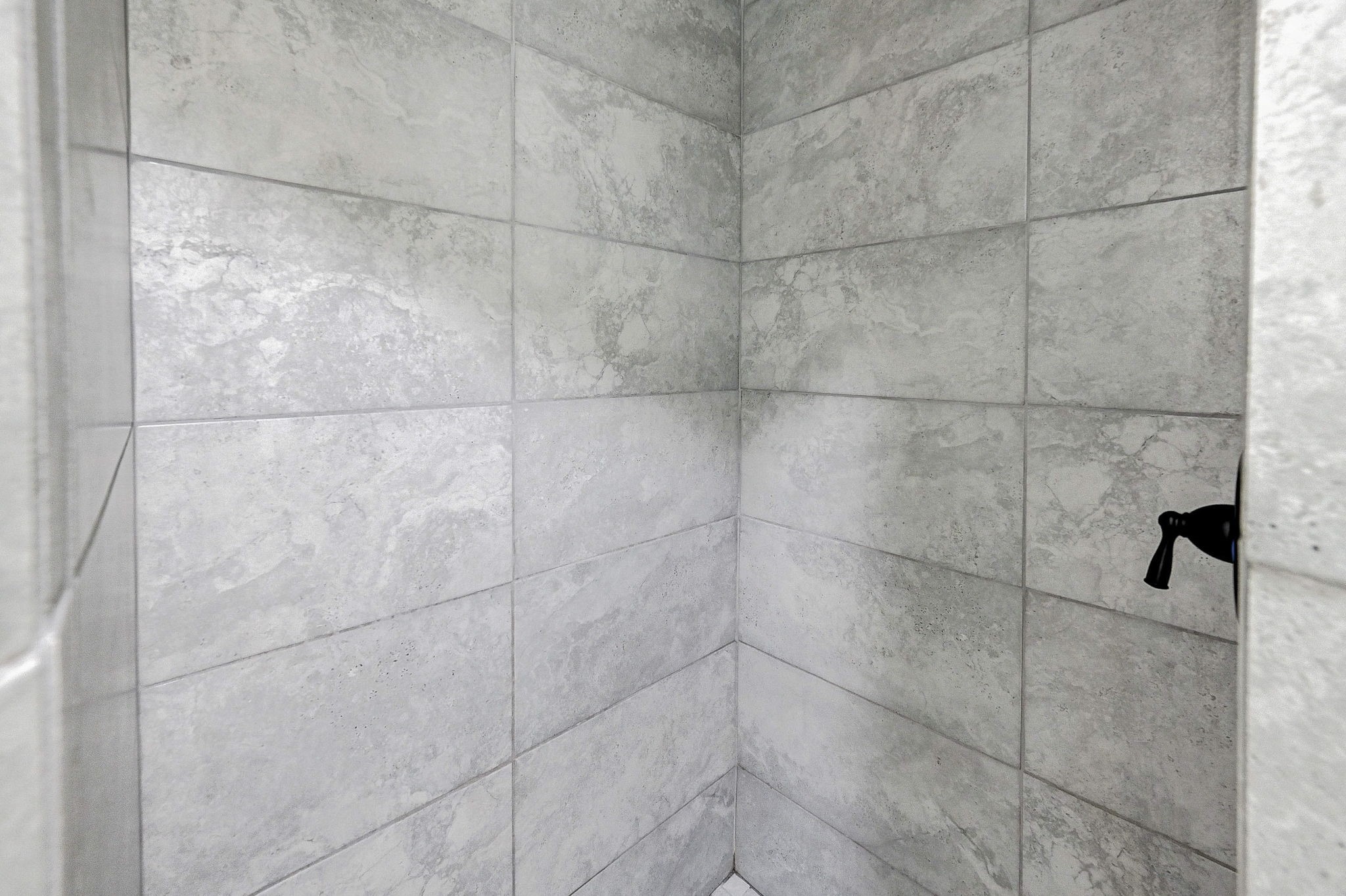 6027 Ledbetter Street Houston, TX 77087 - Photo 16 of 23 a bathroom with a shower