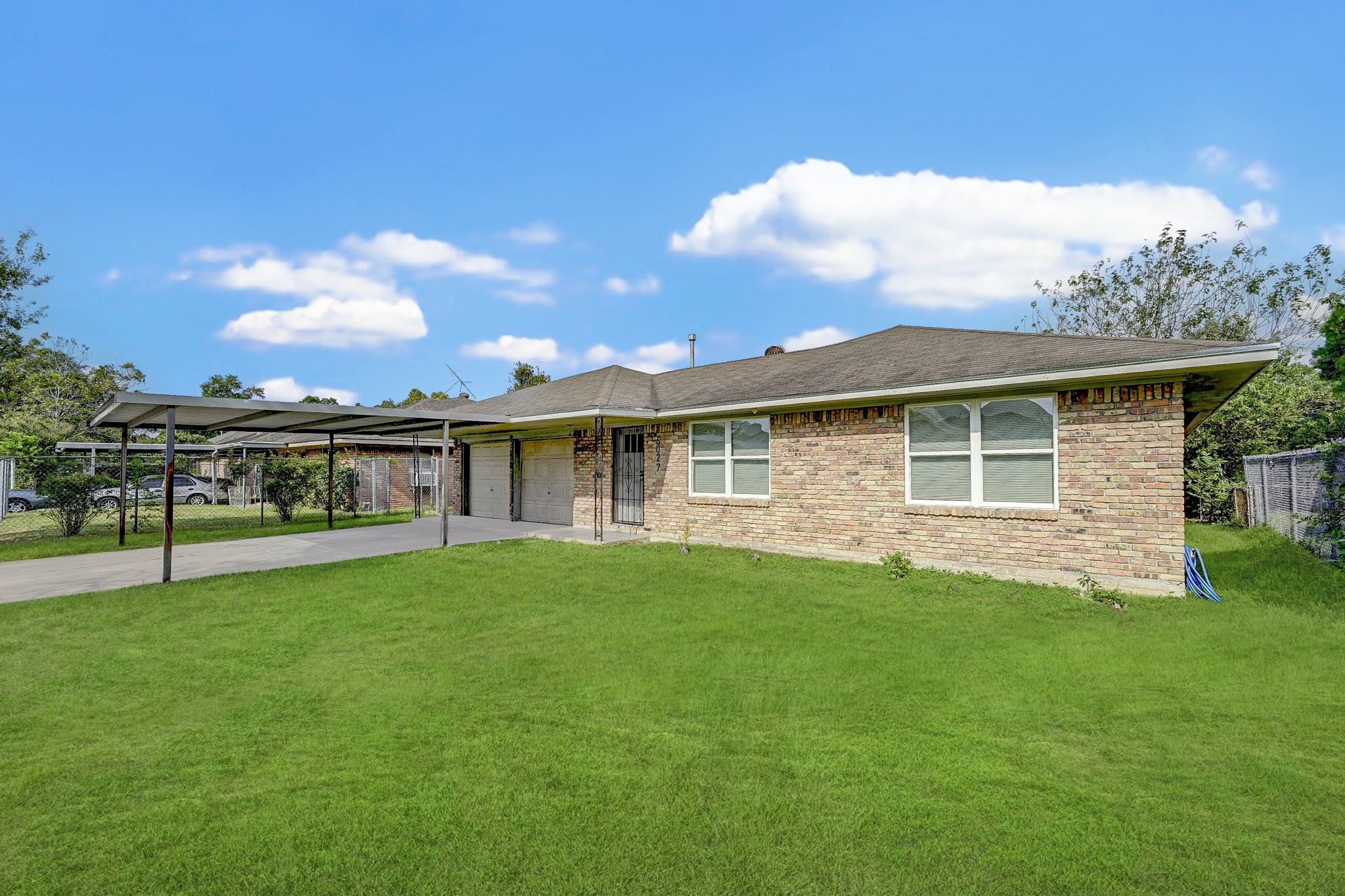 6027 Ledbetter Street Houston, TX 77087 - Photo 2 of 23 a view of a house with a backyard