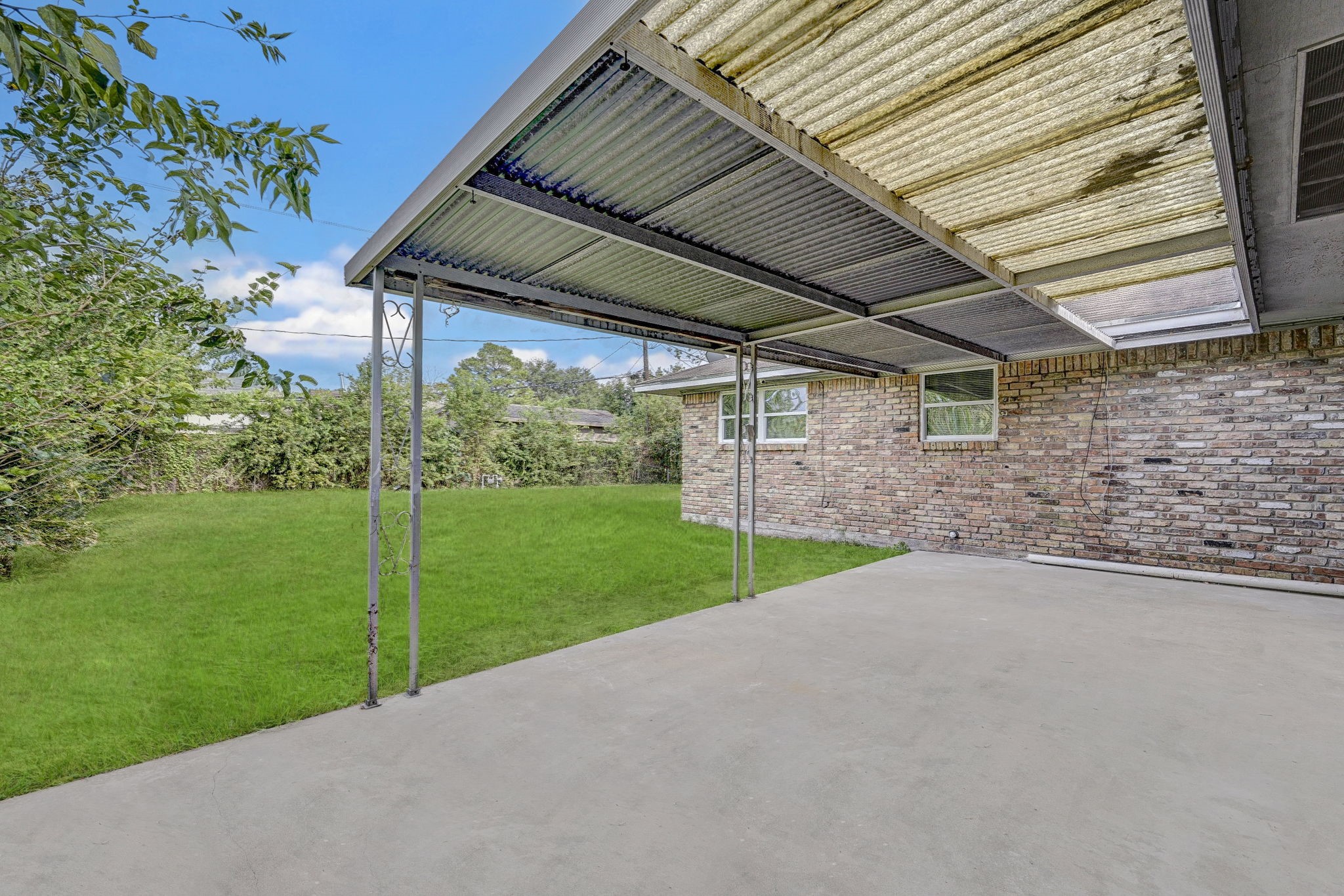 6027 Ledbetter Street Houston, TX 77087 - Photo 21 of 23 a view of a house with backyard and porch