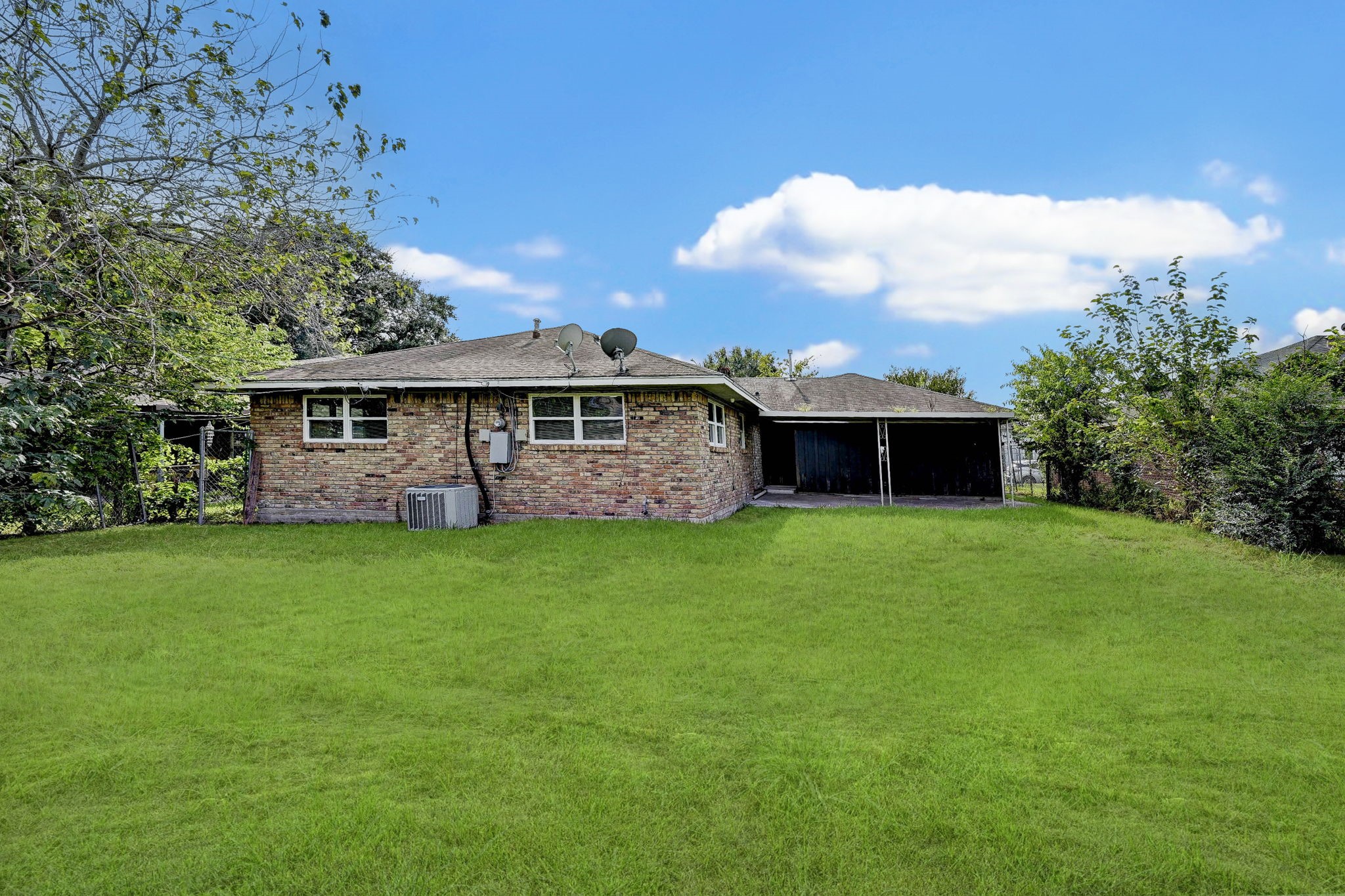 6027 Ledbetter Street Houston, TX 77087 - Photo 23 of 23 a view of a house with a backyard