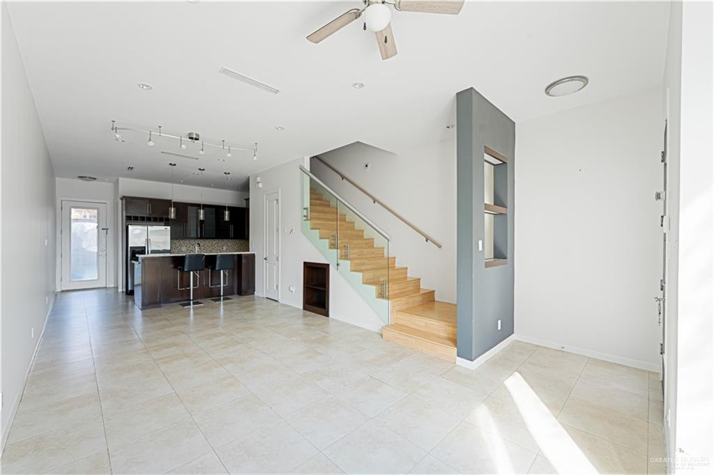 1209 Olympia Avenue, Unit 3 McAllen, TX 78503 - Photo 8 of 21 a view of livingroom with furniture and staircase