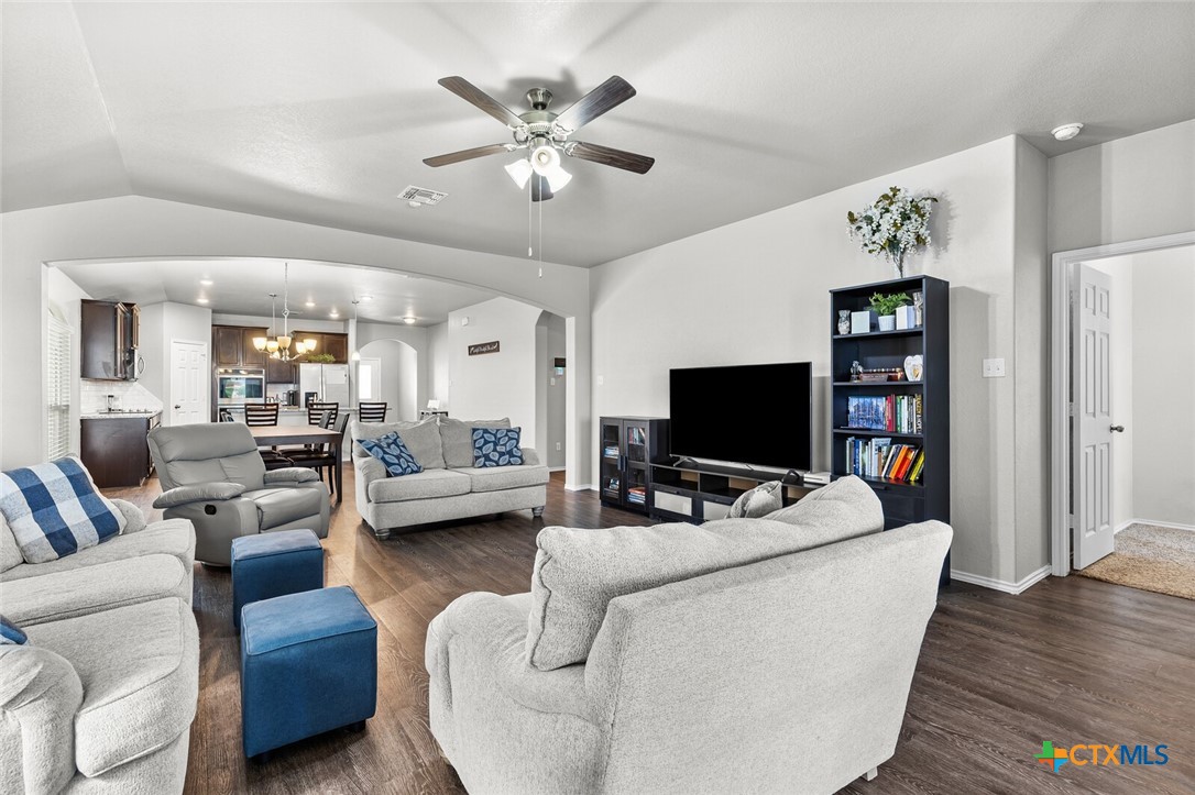 271 Bainbridge Road Temple, TX 76502 - Photo 16 of 36 a living room with furniture and a flat screen tv
