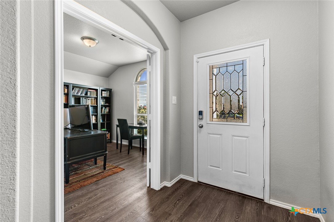 271 Bainbridge Road Temple, TX 76502 - Photo 20 of 36 a view of a hallway with wooden floor and closet