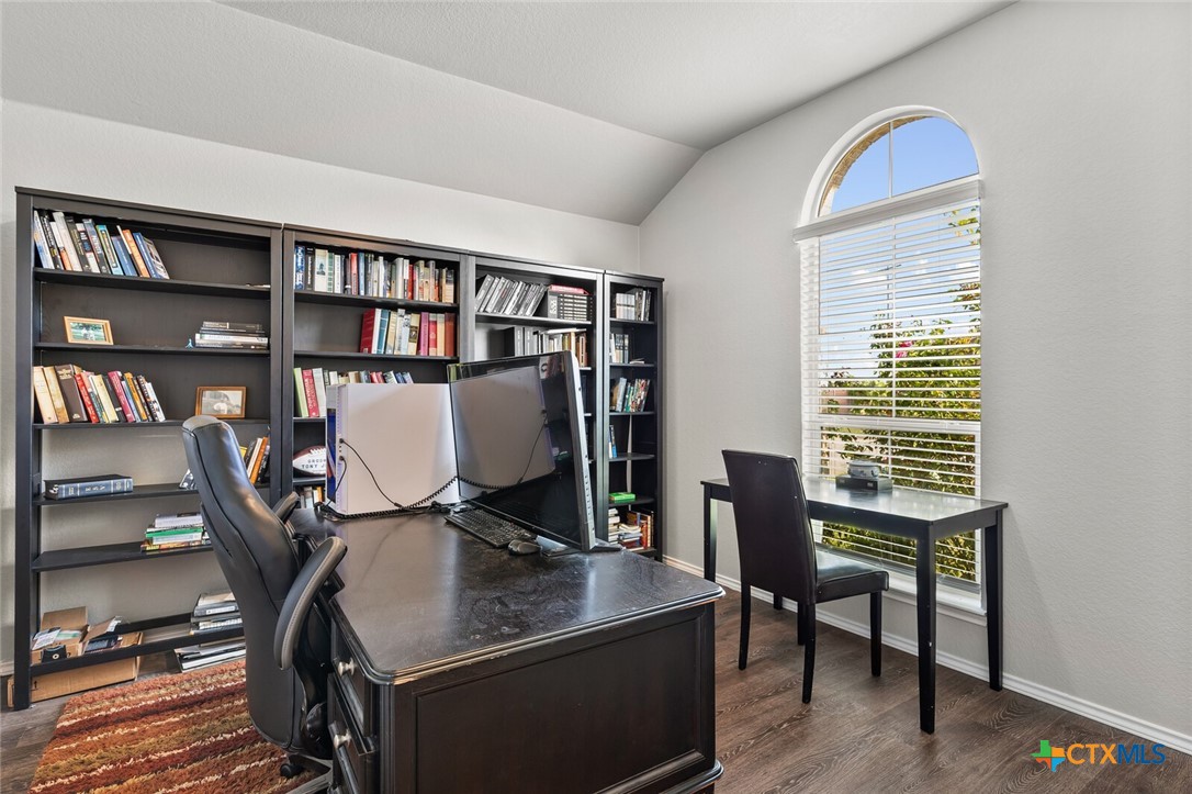 271 Bainbridge Road Temple, TX 76502 - Photo 21 of 36 a view of a workspace with furniture and a window