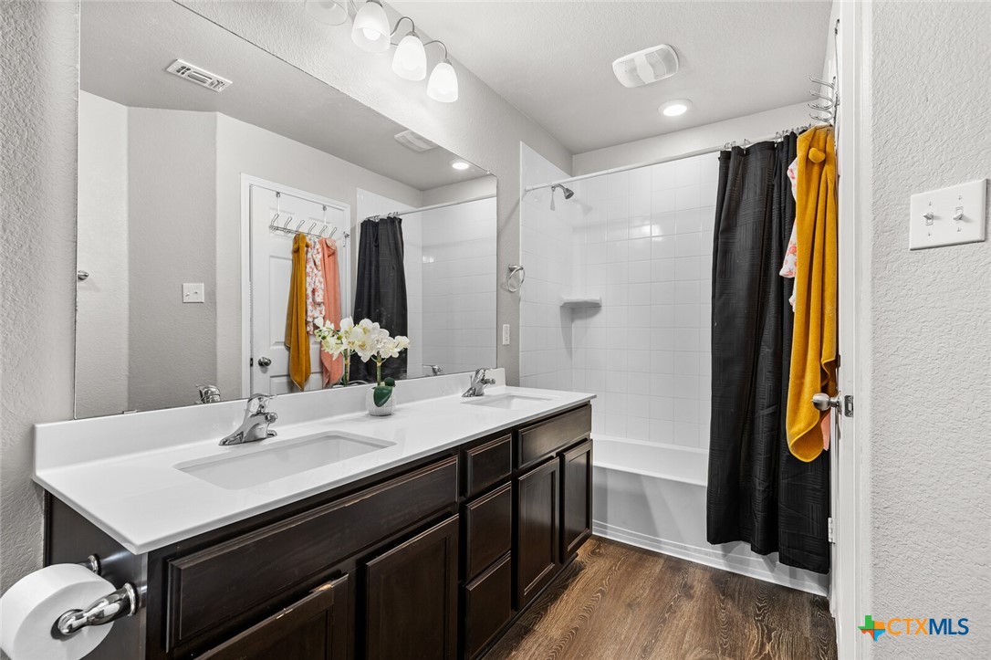 271 Bainbridge Road Temple, TX 76502 - Photo 27 of 36 a bathroom with a sink double vanity and a mirror