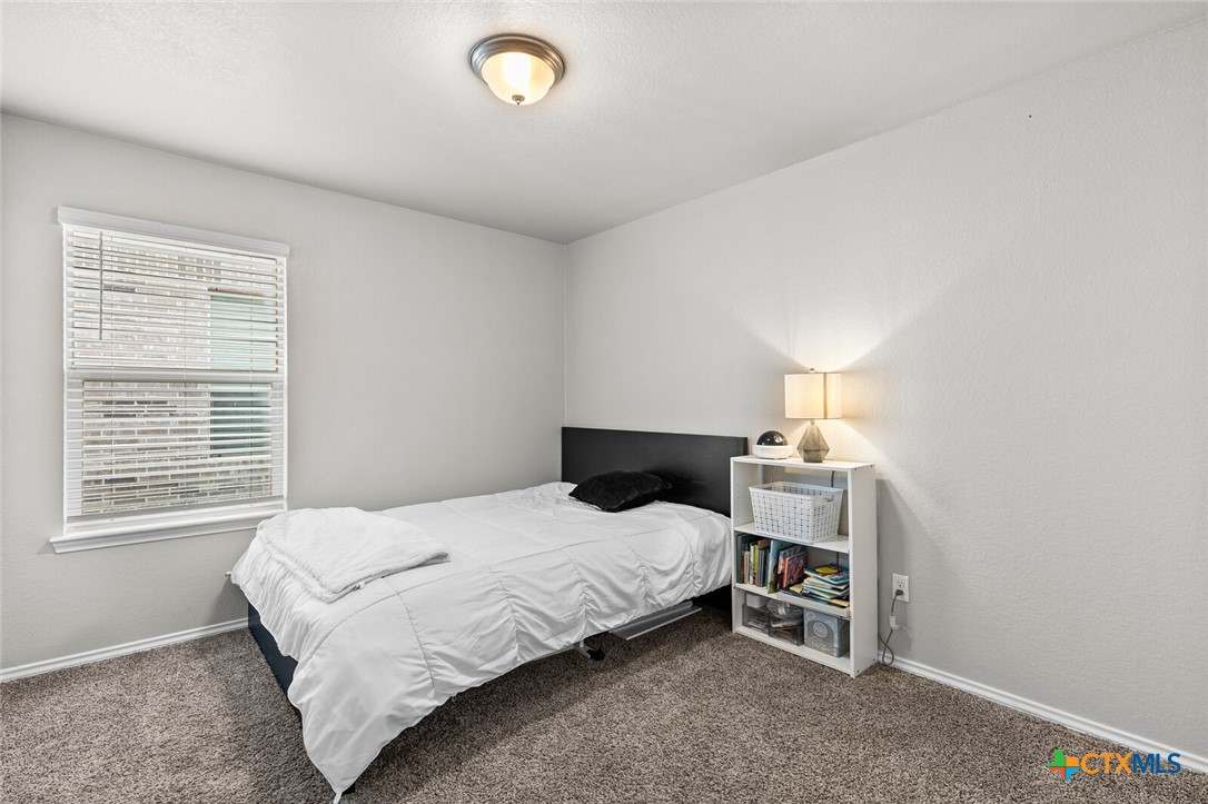 271 Bainbridge Road Temple, TX 76502 - Photo 28 of 36 a bedroom with a bed and a window