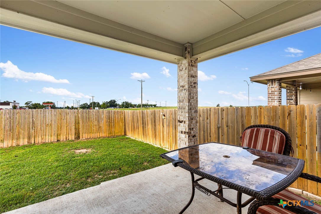 271 Bainbridge Road Temple, TX 76502 - Photo 31 of 36 a view of a patio with a table chairs and a patio