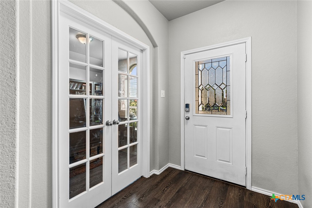 271 Bainbridge Road Temple, TX 76502 - Photo 4 of 36 a view of front door with wooden floor