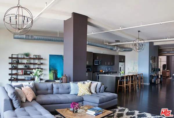 a living room with furniture and a table