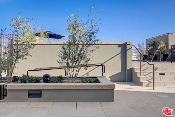 a view of a swimming pool with a terrace