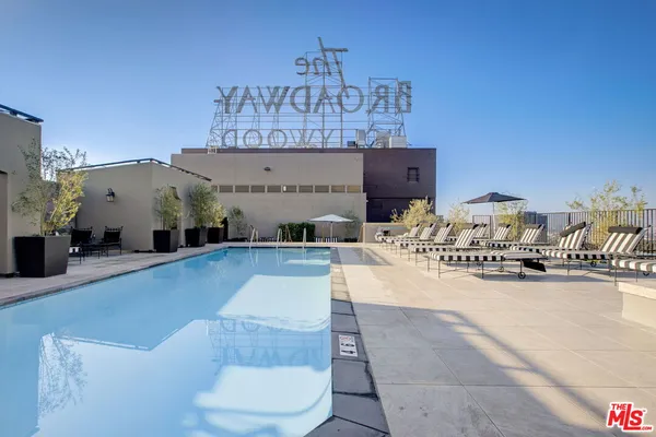 a view of a swimming pool and outdoor space