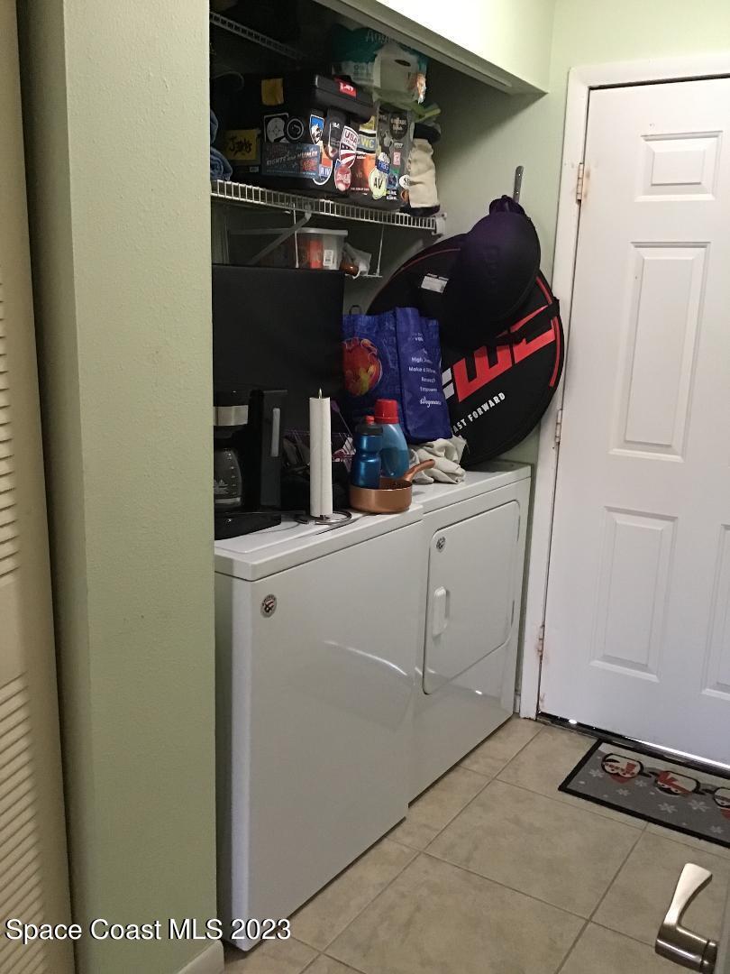 4169 Dividend Avenue Rockledge, FL 32955 - Photo 8 of 12 a room with storage and utility