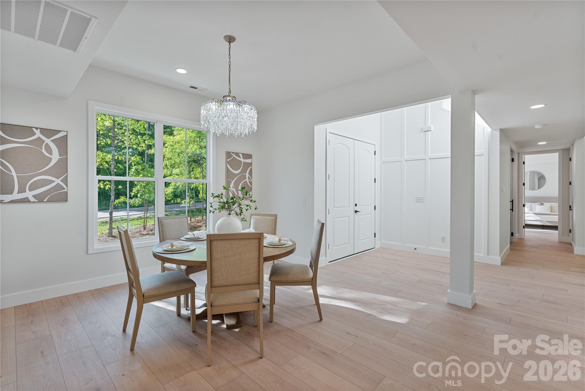 460 Riddle Mill Road Clover, SC 29710 - Photo 11 of 48 a dining room with furniture a chandelier and window