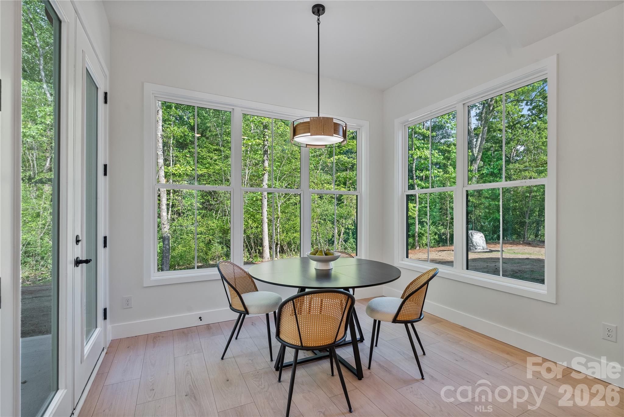 460 Riddle Mill Road Clover, SC 29710 - Photo 12 of 48 a dining room with furniture and wooden floor