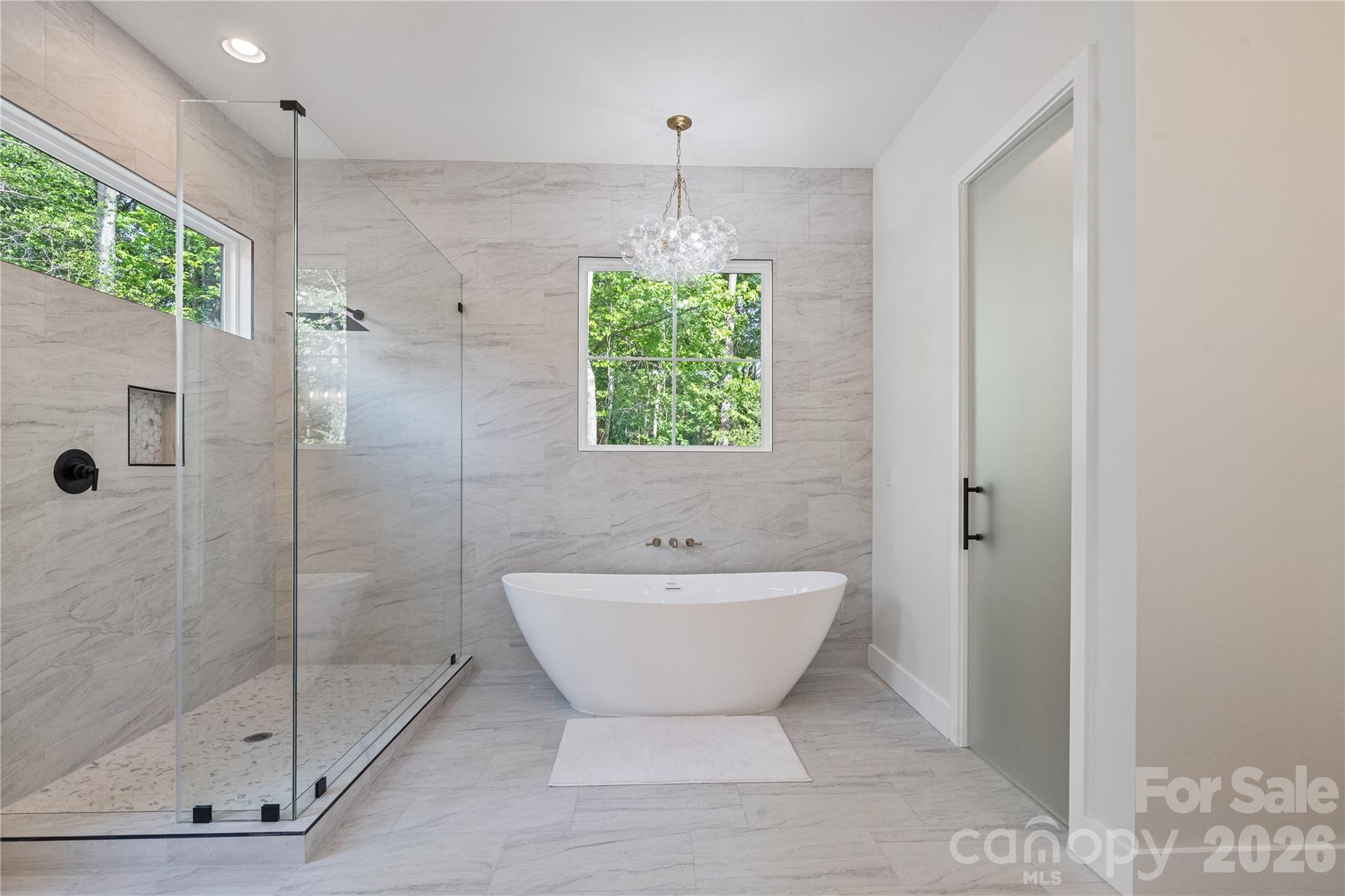 460 Riddle Mill Road Clover, SC 29710 - Photo 21 of 48 a bathroom with a bathtub and shower