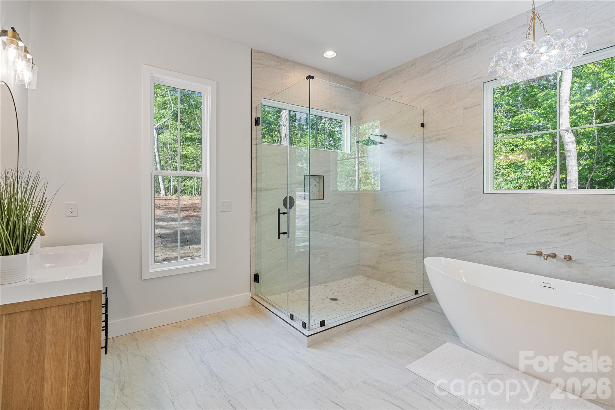 460 Riddle Mill Road Clover, SC 29710 - Photo 23 of 48 a bathroom with a tub and shower