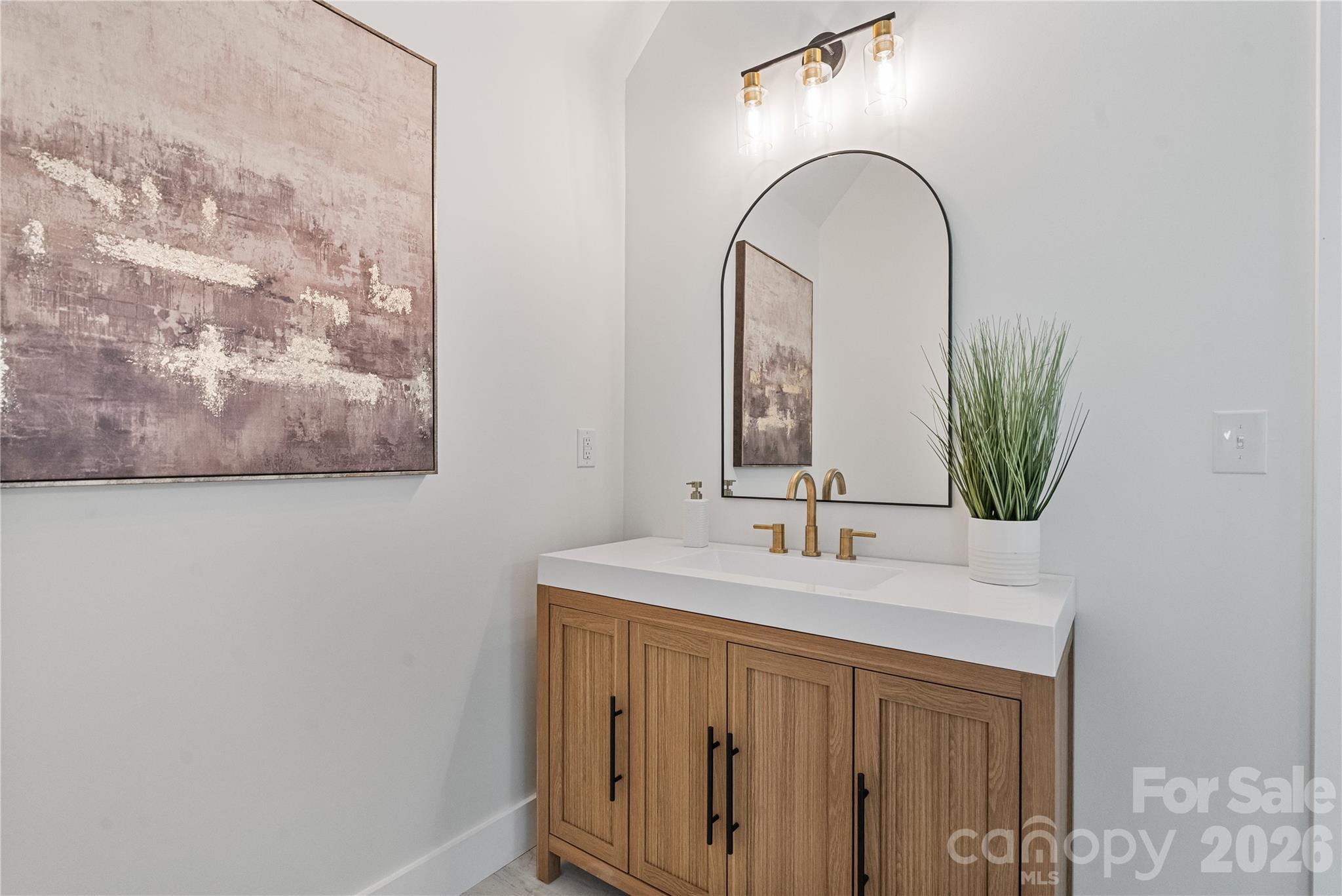 460 Riddle Mill Road Clover, SC 29710 - Photo 24 of 48 a bathroom with a sink and a mirror
