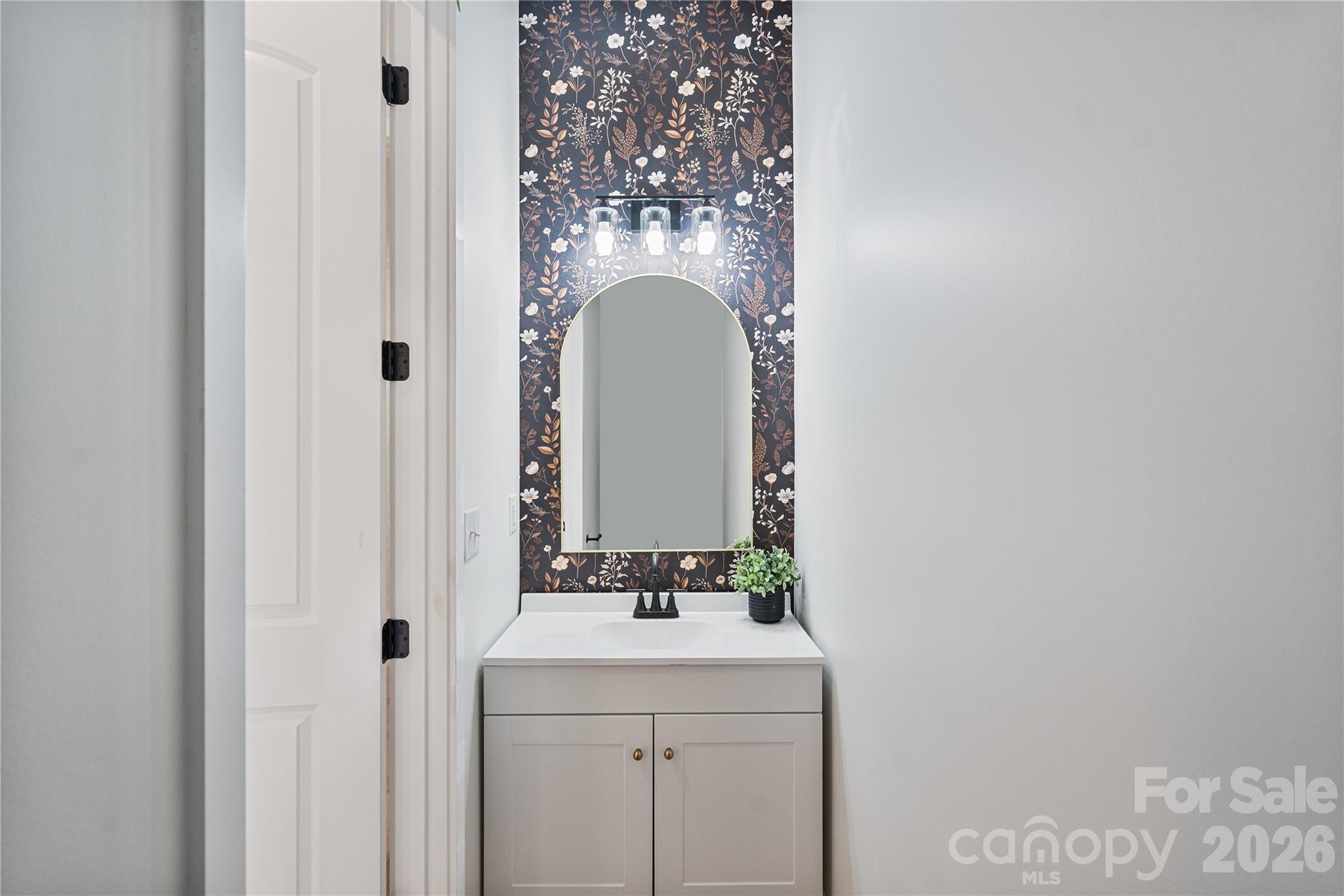 460 Riddle Mill Road Clover, SC 29710 - Photo 27 of 48 a bathroom with a sink and a mirror