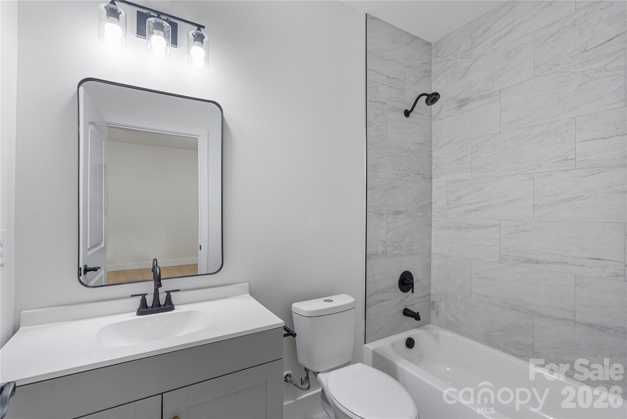 460 Riddle Mill Road Clover, SC 29710 - Photo 37 of 48 a bathroom with a sink a toilet and shower