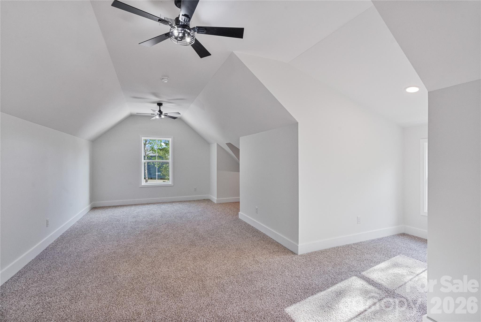 460 Riddle Mill Road Clover, SC 29710 - Photo 38 of 48 an empty room with windows and fan