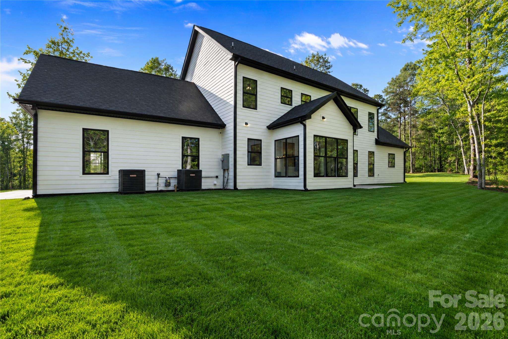 460 Riddle Mill Road Clover, SC 29710 - Photo 46 of 48 a front view of a house with a garden