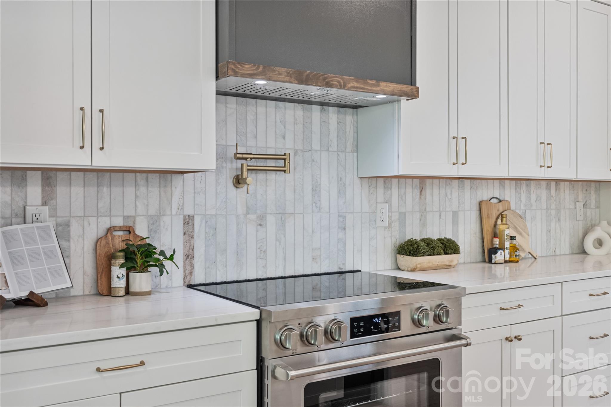 460 Riddle Mill Road Clover, SC 29710 - Photo 5 of 48 a kitchen with a stove and cabinets