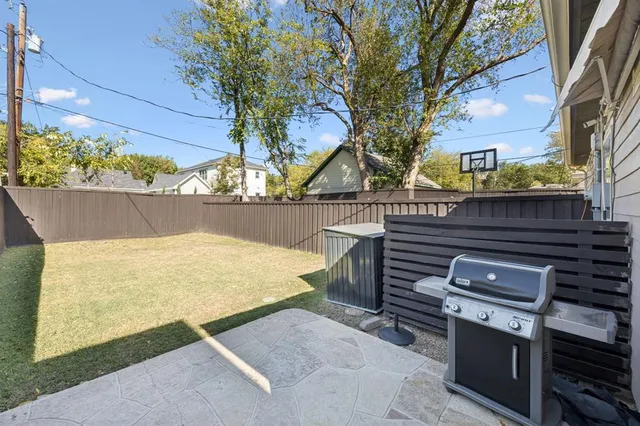 a view of a backyard with a tub