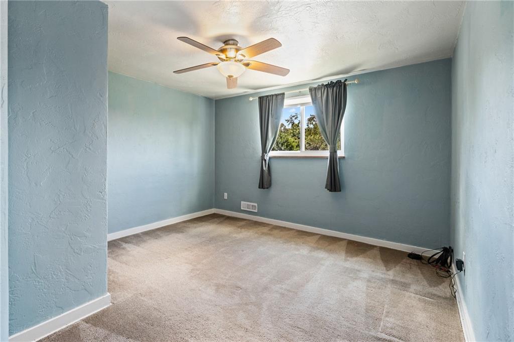 2106 Lappe Lane Pittsburgh, PA 15212 - Photo 11 of 20 an empty room with windows and painted walls