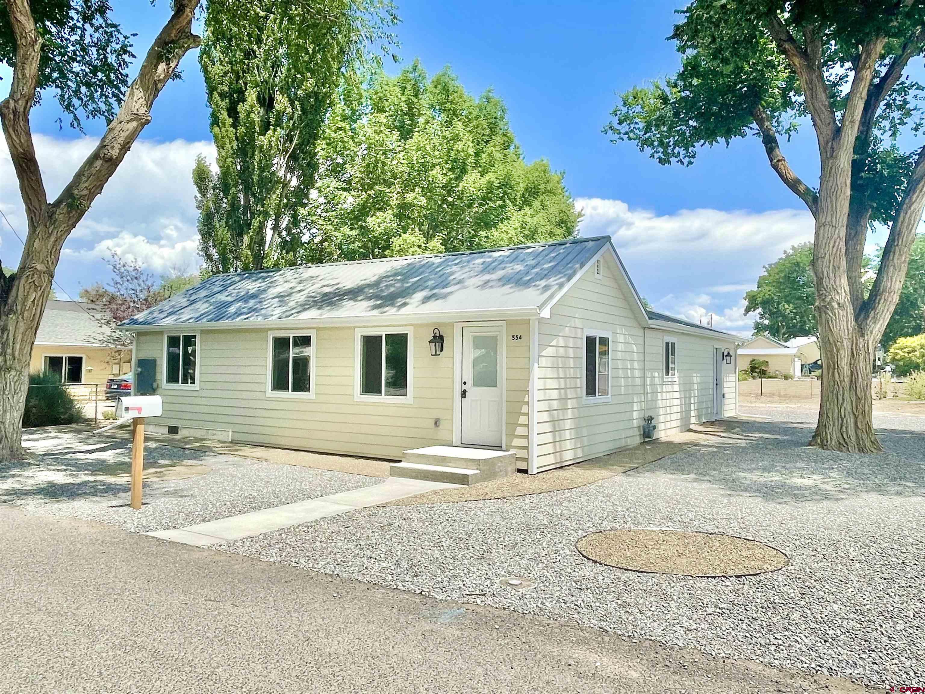 554 A Street Delta, CO 81416 - Photo 1 of 33 a view of a house with a patio