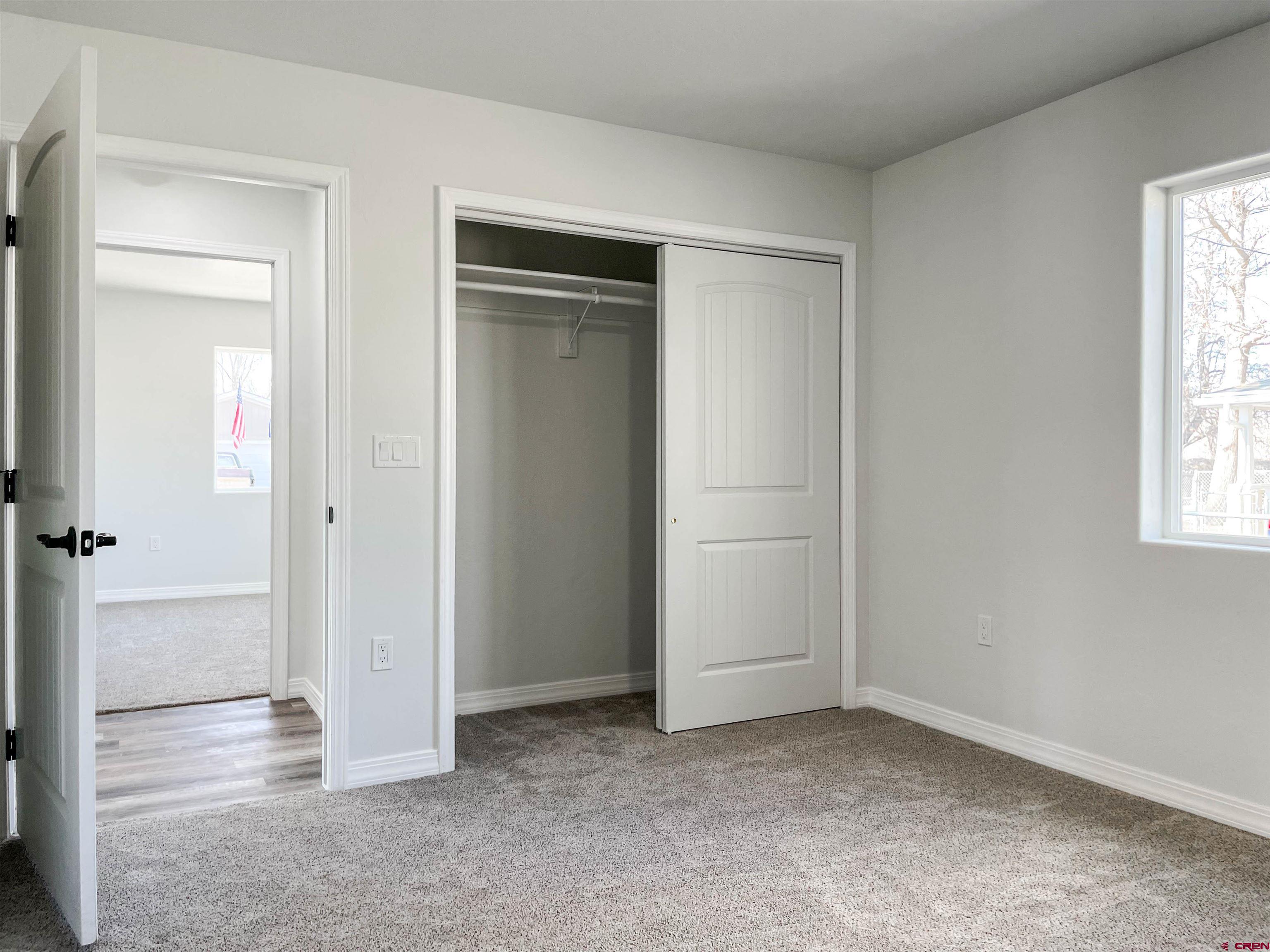 554 A Street Delta, CO 81416 - Photo 32 of 33 an empty room with windows and closet