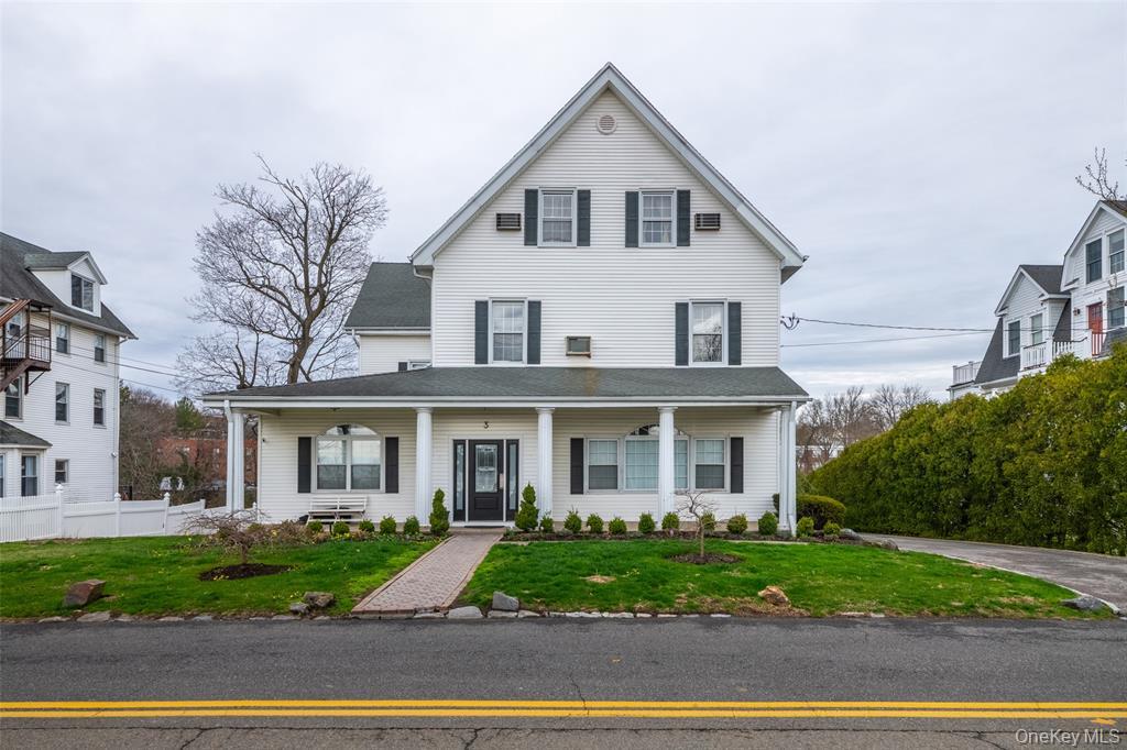 3 Harbor Lane, Unit 3A New Rochelle, NY 10805 - Photo 1 of 16 a front view of a house with a yard