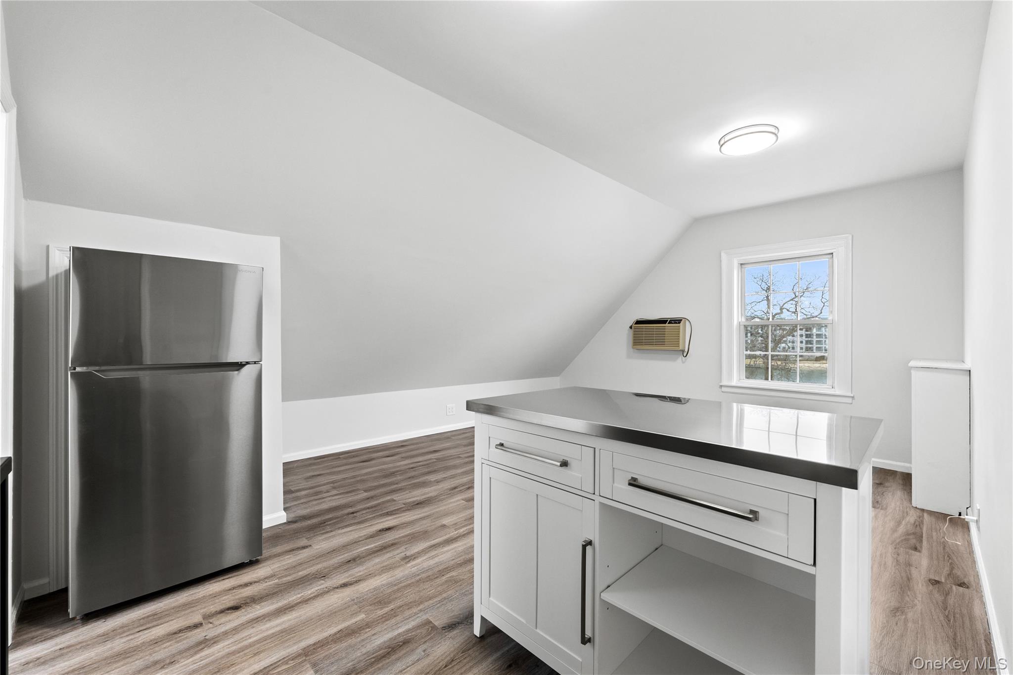 3 Harbor Lane, Unit 3A New Rochelle, NY 10805 - Photo 2 of 16 a kitchen with a refrigerator and a stove top oven