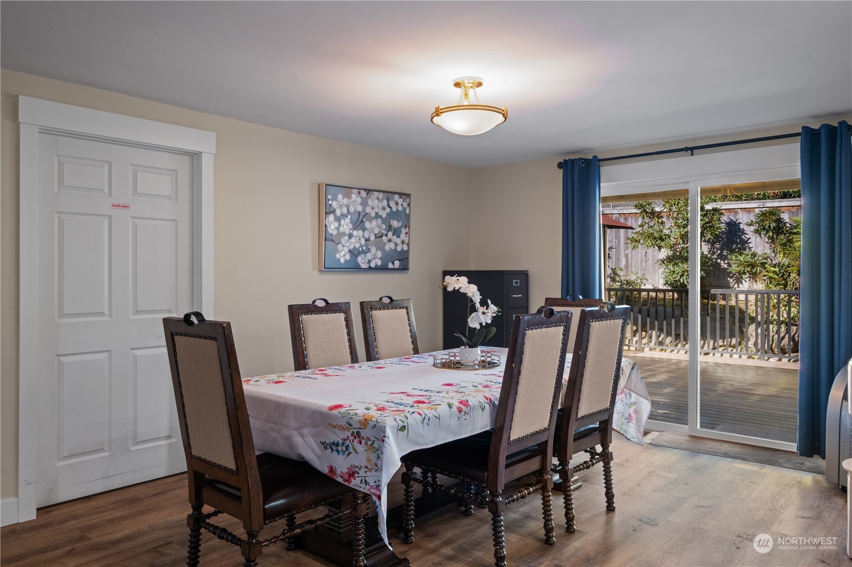 Undisclosed Address Bellevue, WA 98008 - Photo 11 of 28 a view of a dining room with furniture window and wooden floor