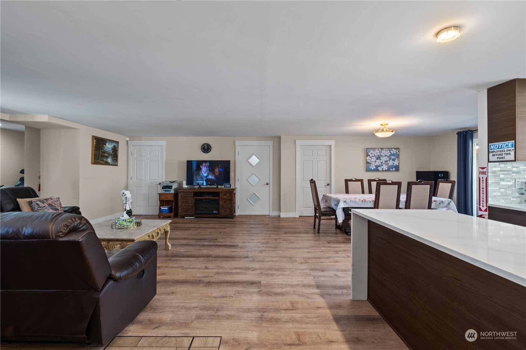 Undisclosed Address Bellevue, WA 98008 - Photo 14 of 28 a living room with furniture and a flat screen tv