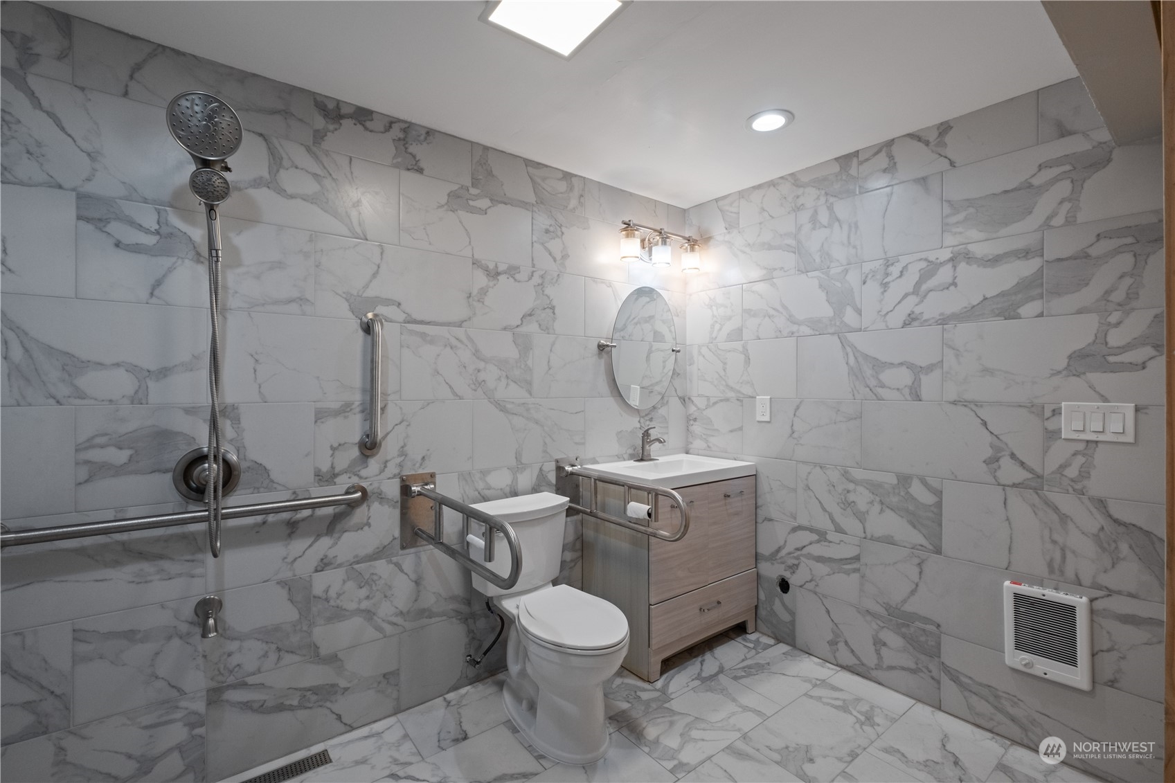 Undisclosed Address Bellevue, WA 98008 - Photo 17 of 28 a bathroom with a granite countertop toilet sink and shower