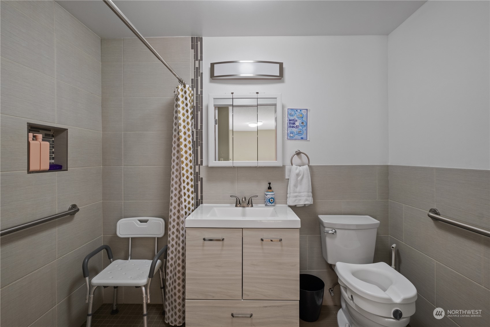 Undisclosed Address Bellevue, WA 98008 - Photo 19 of 28 a bathroom with a toilet sink and mirror