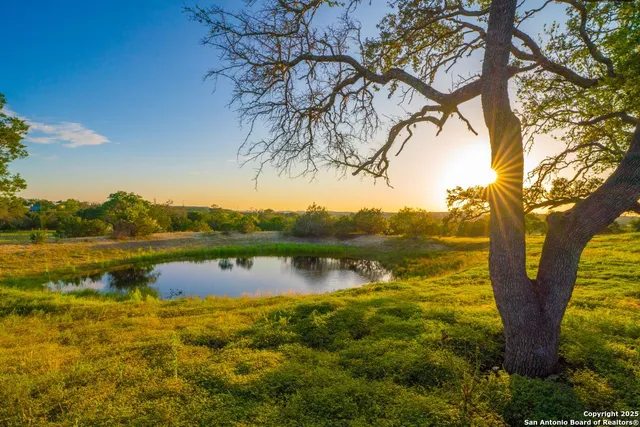 a view of lake with mountain in the background