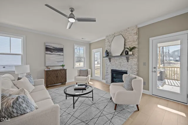 a living room with furniture and a rug